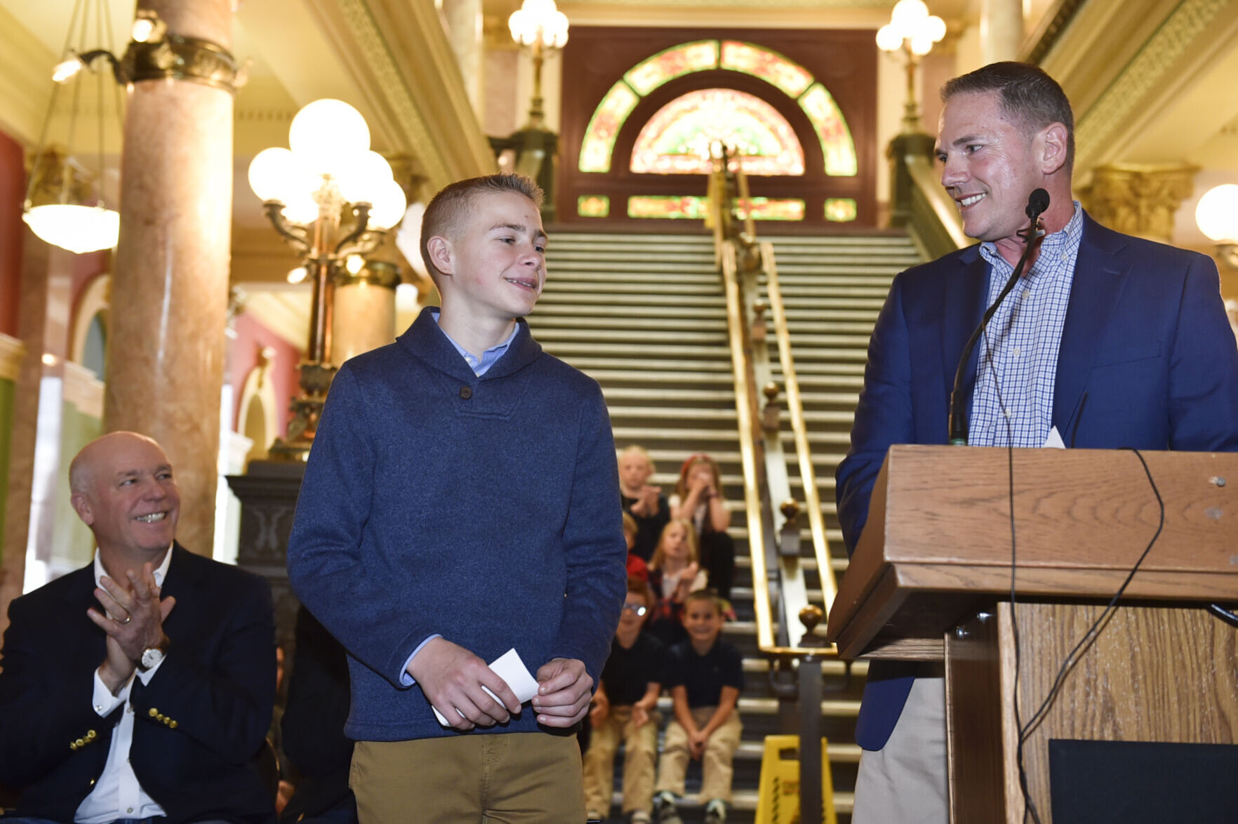 Joseph Dunn, right, and his adopted son Caelum